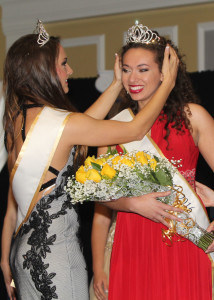 The new Miss ETBU, Brittany Smith, receives her crown from Miss ETBU 2015 Morgan Garrett. The 60th Miss East Texas Baptist University Scholarship Pageant was held on April 2 in Baker Auditorium of the Ornelas Spiritual Life Center. Miss Smith is a sophomore nursing major from Los Angeles, California. PHOTO: ETBU/Mike Midkiff. 
